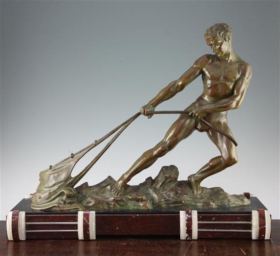 Attributed to Ouline. A French Art Deco patinated metal model of a male fisherman hauling his catch, 27.75in.